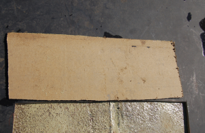 3. This layer of high-density board had no attachment whatsoever to the concrete roof deck. Notice the sprayfoam adhesive is fully cured and did not attach to the substrate board.