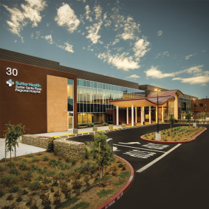 The state-of-the-art hospital features 24-gauge Span Seam roof curve structures in a custom Sienna color.