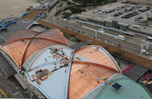 CopperPlus was installed in stages over the domes at Lambert-St. Louis International Airport. Like solid copper, copper-clad stainless steel acquires a patina over time.
