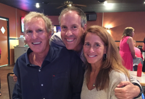 Her Roofing family was in attendance (shown here at the rehearsal dinner). From left to right: John Riester, vice president of business development; Barrett Hahn, publisher, who served as the wedding photographer; and Becky Riester, who was a bridesmaid.