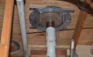 PHOTO 2: Roof drains need to be secured to the roof deck with under-deck clamps so they cannot move.