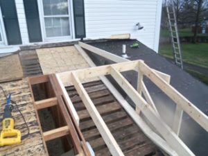 Thrush & Son had to make several changes to the home, including removing the box gutters, cutting off the rafter tails and installing new fascia board.