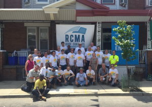  International Roof Coatings Conference attendees volunteered to apply reflective roof coatings to 18 row homes in north Philadelphia.