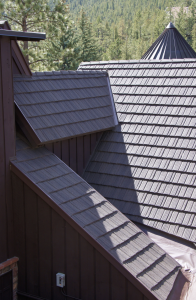 The stone-coated metal roofing system is designed to give the appearance of wood shake but has a Class A fire rating, a 2 1/2-inch hailstone warranty and a 120-mph wind warranty. 