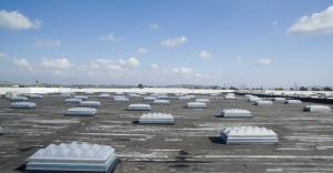 As part of the project, Highland Commercial Roofing changed out 295 old skylights and smoke-vent skylights across the roof, replacing them all with new UL793-compliant smoke-vent skylights. Photo courtesy of SKYCO Skylights. 