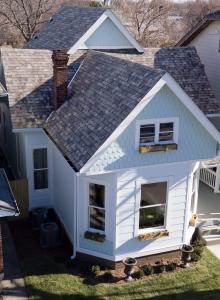 Karen E. Laine and Mina Starsiak believe since the roof is such a prominent exterior component, figuring out how it plays into the home’s color palette is crucial. Their home in the Indianapolis area is shown here. Photo: Owens Corning.