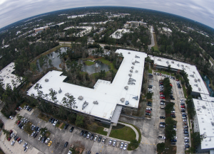 The roof was replaced on Huntsman Corporation’s Advanced Technology Center, an L-shaped, 70,000-square-foot facility housing expensive equipment and research labs. A TPO membrane roof system was installed over high-density polyiso cover board.