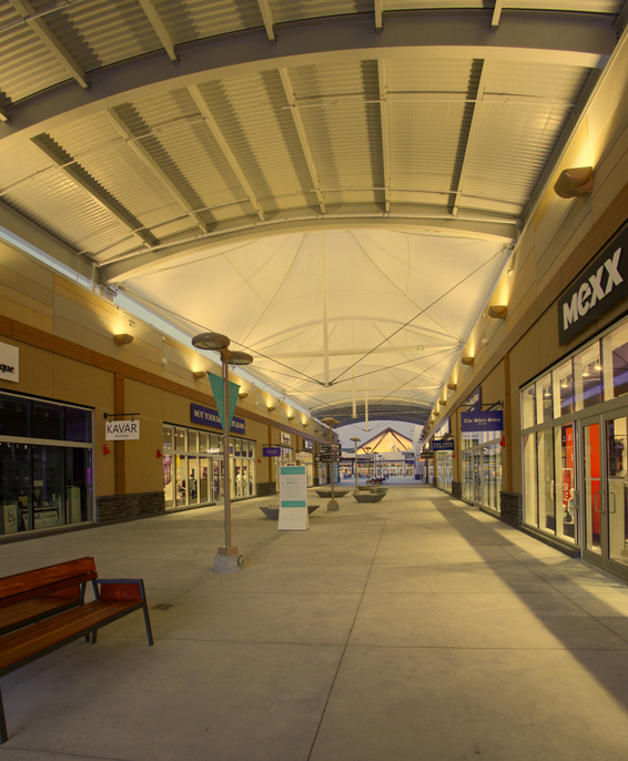 The largest open-air outlet mall in Canada features approximately 23,000 square feet of PTFE fiberglass membrane walkway canopies.