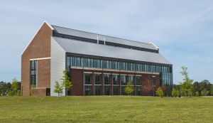 A total of 40,000 square feet of interlocking zinc panels are used on the walls and standing-seam zinc panels are installed on the roof of the building to provide long-lasting durability and an impressive visual aesthetic.