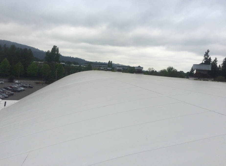 Because of the steep slope of this roof, the Columbia Roofing & Sheet Metal crew installed 60-mil Sureweld HS (High Slope) TPO.