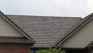 Polymer roofs installed by Heiland Roofing and Exteriors, Wichita, received very little if any damage during the microburst.
