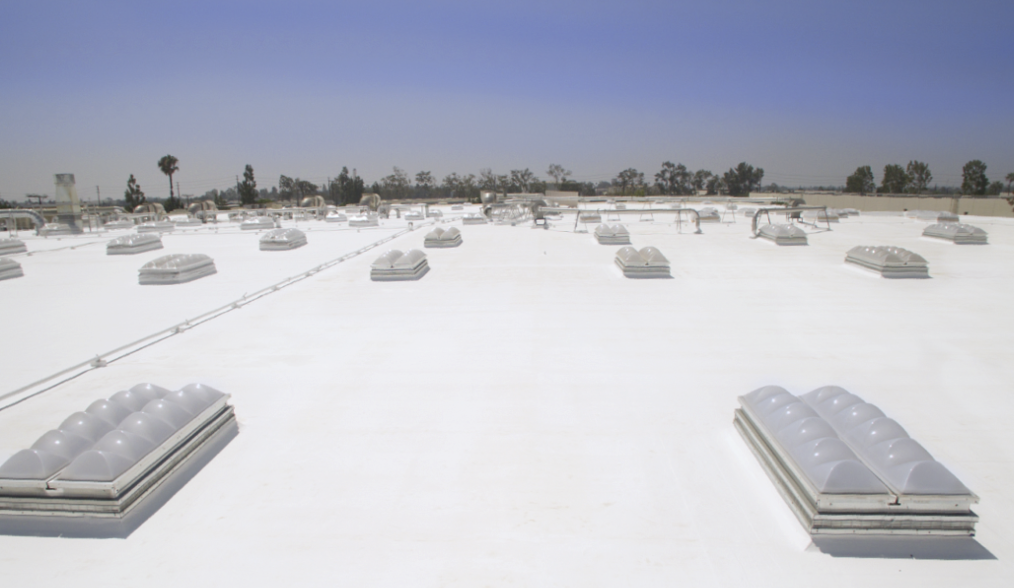 Roof Sections of Cosmetics Manufacturing Facility Get Expert Makeover With Cold-applied System, SPF and Smoke-vent Skylights