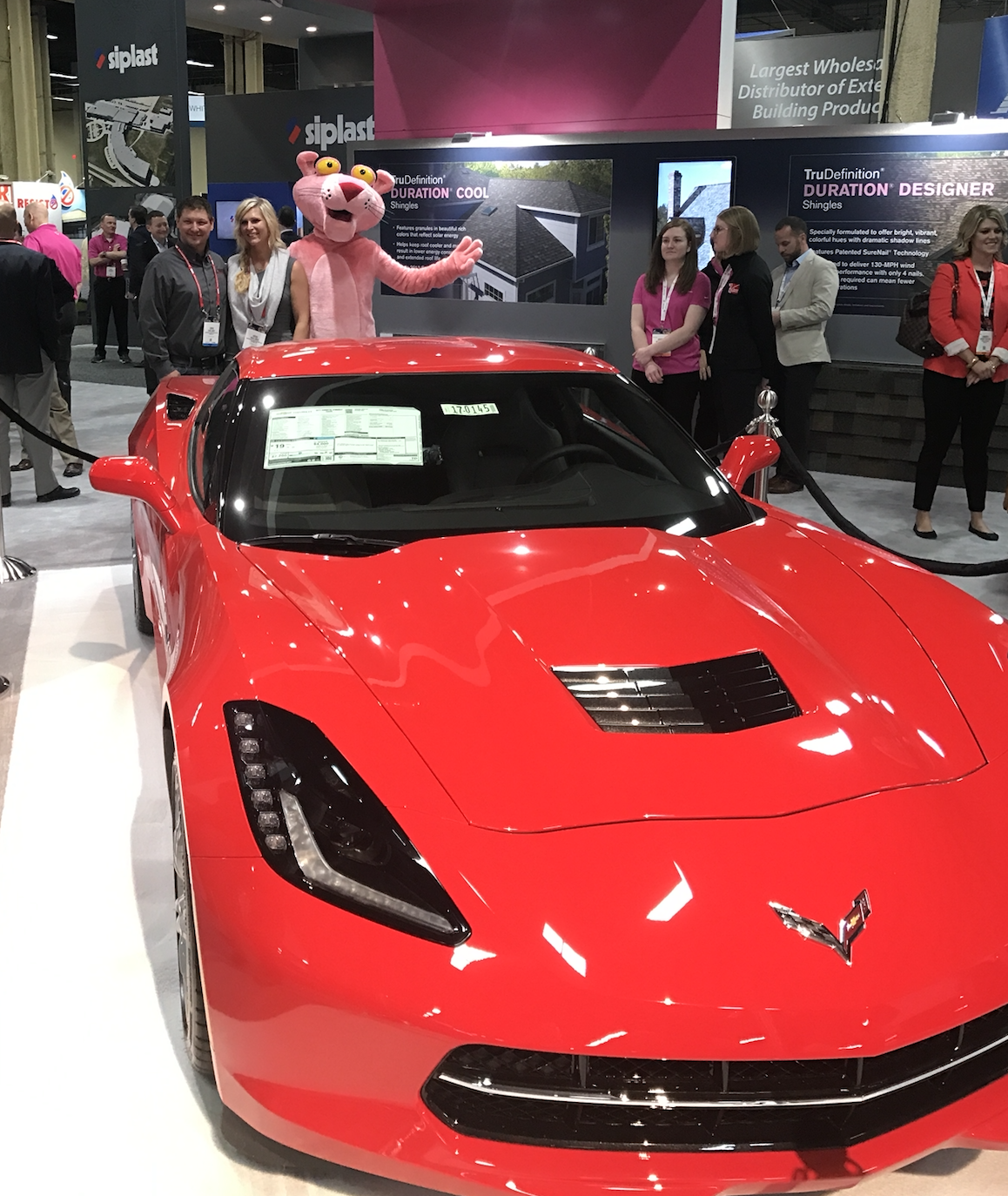 Chris Amiot (left) of Advantage Construction Inc. was awarded the Grand Prize of a 2017 Chevrolet Corvette Stingray Coupe in Owens Corning’s 2017 Accelerate Sweepstakes.