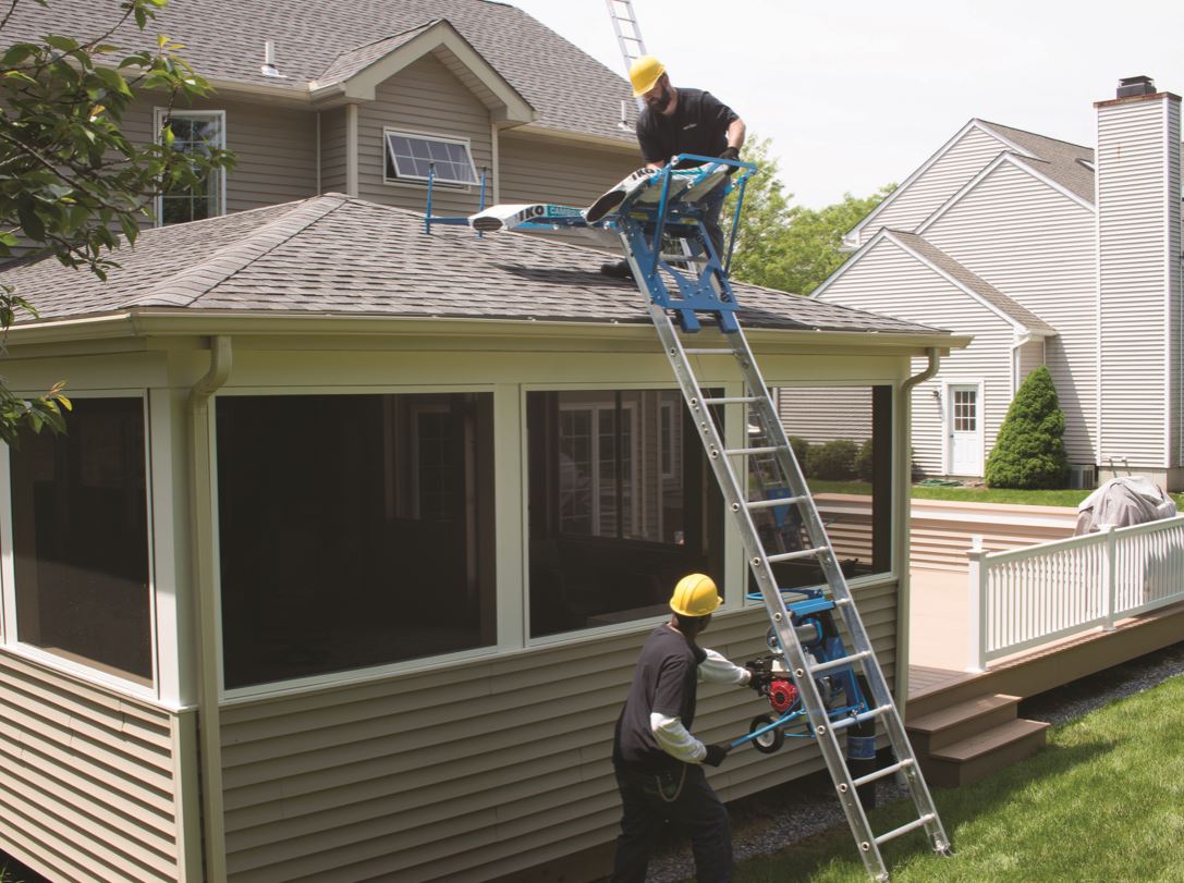 Ladder hoists can easily transport up to 400 pounds of materials to high rooftops.