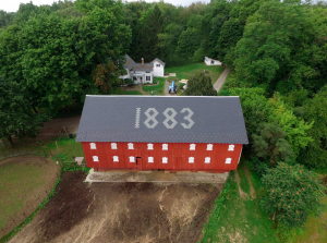 This timber-framed Standard Pennsylvania-style barn was originally erected in 1883. When its slate roof deteriorated beyond repair, it was replaced with a synthetic slate roof manufactured by DaVinci Roofscapes and installed by Absolute Roofing.