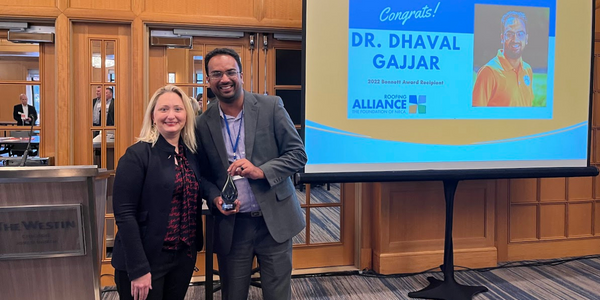 Roofing Alliance President Kelly Van Winkle and Dr. Dhaval Gajjar