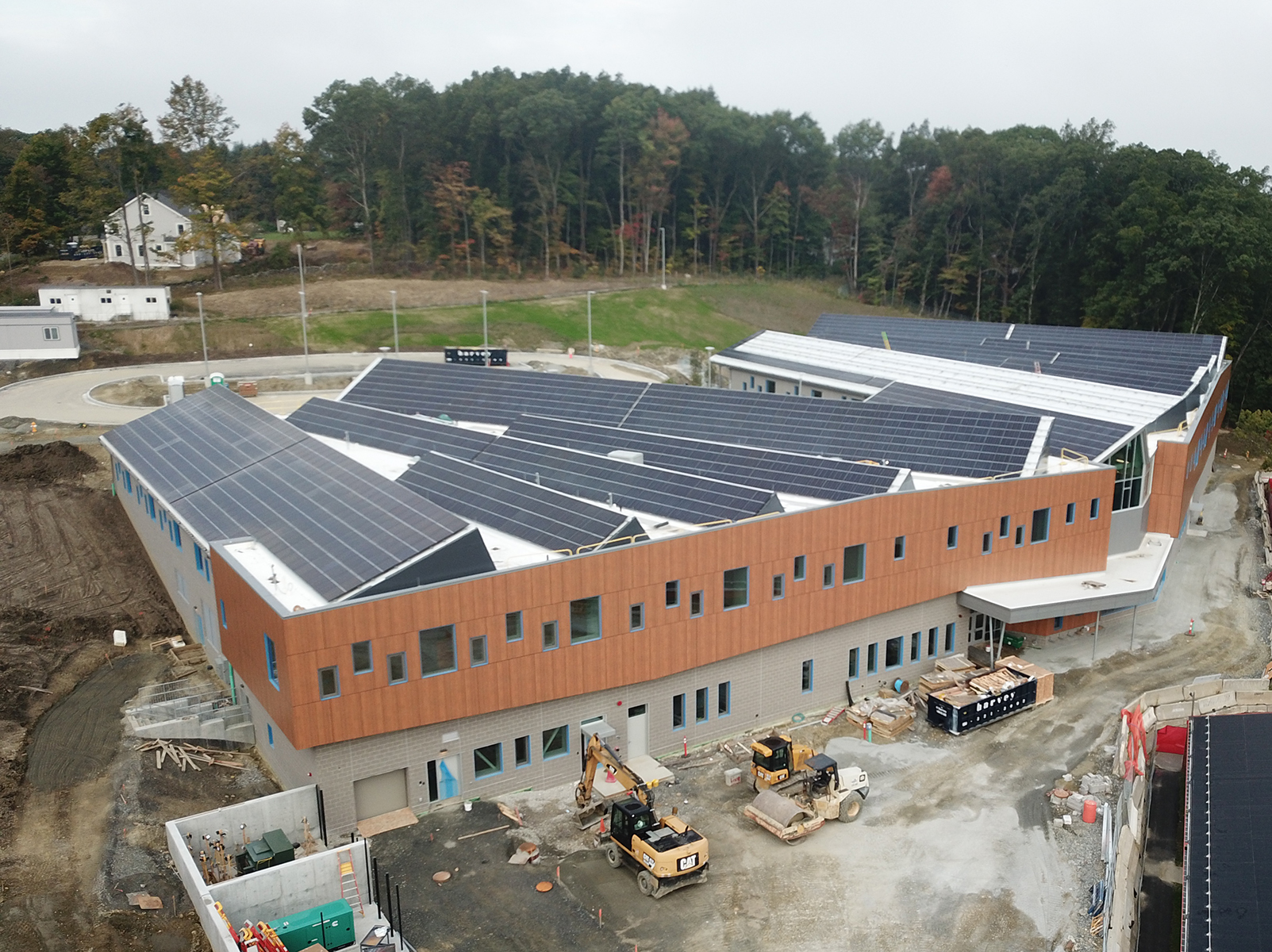 Award-Winning School With Unique Roof Design Has Minimal