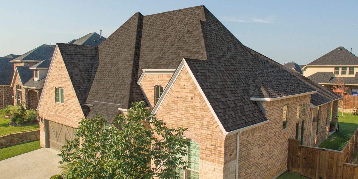 Digital rendering of Atlas' pinnacle impact shingles on a home 