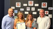 Lily Hebert receives the 2023 Garland Scholarship. Pictured from left are Garland employee-owner Jay Hebert, Lily Hebert, Kristy Hebert, and Garland Industries President & CEO Dave Sokol.