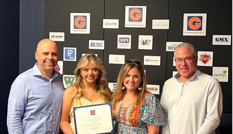 Lily Hebert receives the 2023 Garland Scholarship. Pictured from left are Garland employee-owner Jay Hebert, Lily Hebert, Kristy Hebert, and Garland Industries President & CEO Dave Sokol.